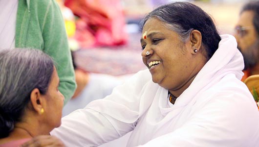 Mata Amritanandamayi “Amma” smiles during a “Darshan” in Toronto. She is also referred to as the “Hugging Saint”. (Pictures by Mahesh Abeyewardene)
