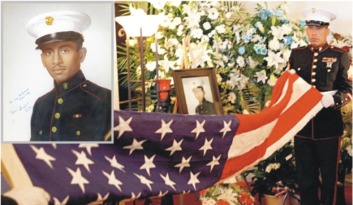 United States Marines perform military honors for Rajah at his funeral in Los Angeles last year.