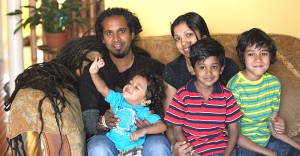 Sudesh Muthu with his wife Irosha and three sons, Vehan, 2, Thedavi, 5  and Nesta,8 at their Thornhill, Ontario residence. (Picture by Mahesh Abeyewardene)