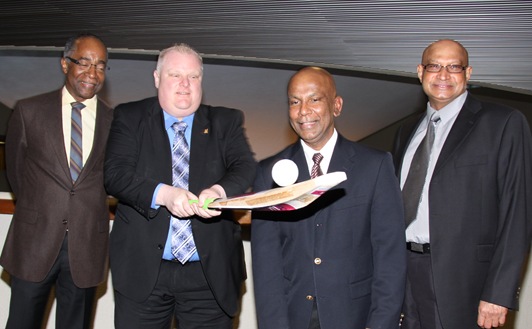 Toronto Mayor Rob Ford balances a cricket ball at City Hall surrounded by Ranil Mendis, Peter Karunaratne and Ken Jeffers. Picture by Bashir Nasir