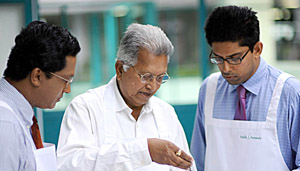 Merrill J. Fernando with his sons owners Dilmah Tea Estate in Sri Lanka