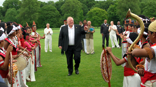 Mayor Rob Ford receives a warm welcome from traditional Sri Lankan dancers.