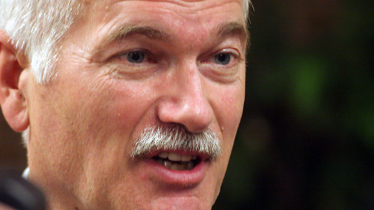 Jack Layton speaks to reporters about the situation in Sri Lanka in this April 2009 file photo in Toronto. (Picture by Mahesh Abeyewardene)