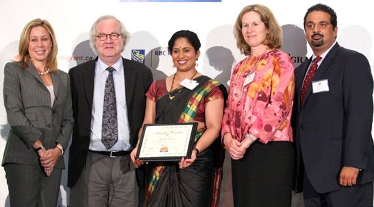 Barrister and Solicitor Meleni David receives the Top 25 Immigrants Award. From left: Canadian Senator Linda Frum, Jennifer Tory, RBC Regional President of Greater Toronto, Toronto Star Publisher John Cruickshank and Canadian Immigrant Magazine Publisher Gautam Sharma. (Pictures by Mahesh Abeyewardene)