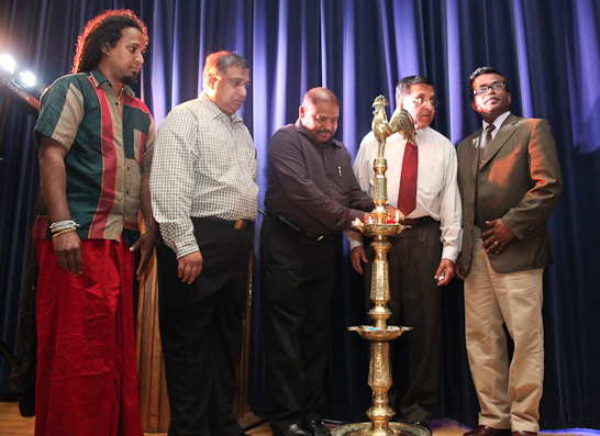 Lighting the traditional oil lamp: Sri Lanka Consul Karunaratne Paranavitana, Voice of Lanka television show producer Ranjith Wickreamasinghe, Sudesh Muthu and Brisk Cargo President A.R. Nathan