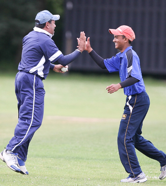 Ravishankar celebrates a catch to dismiss a SPC batsman.