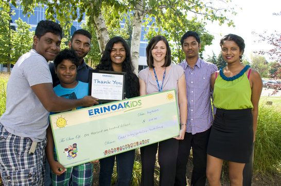 Credit Valley Sports Club Youth Group presenting the cheque to Shelley Maynard of Erinoakkids.