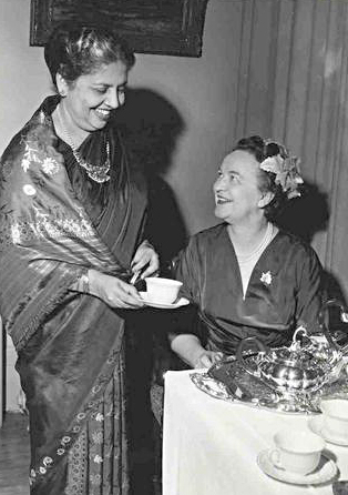 Prime Minister Diefenbaker’s wife Olive pours tea as she chats with the wife of Ceylon High Commissioner at her residence during the Independence Day reception in 1960. 