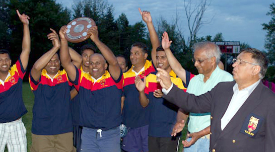 Trinity College celebrate their win on July 26.