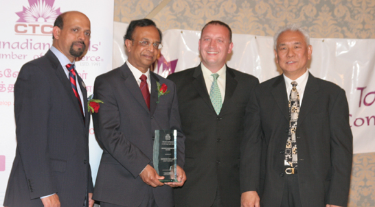 Professor Chelva receives an award from  the Canadian Tamils Chamber of Commerce April at Fairmount Royal York in April 2010.