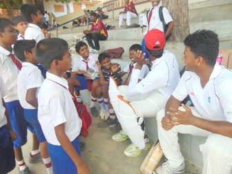 Toronto school cricketers interact with Sri Lankan children. 