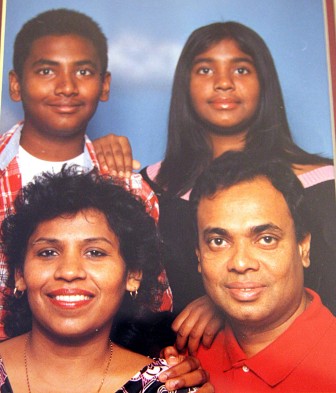 HAPPY FAMILY: Brian and Eleesha with their parents Antonnette and Jayantha who migrated from Sri Lanka in 2000.