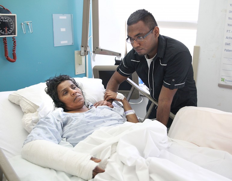Antonnette Wijieratne with her son Brian at Sunnybrook hospital recovering from life-threatening injuries. (Picture by Mahesh Abeyewardene)
