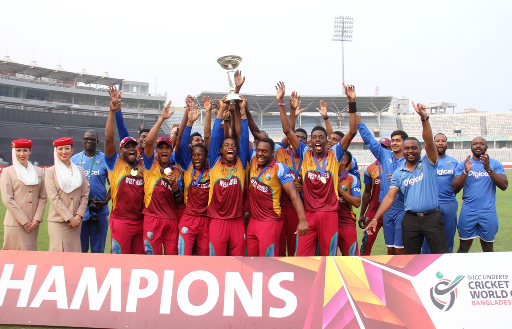 WI player celebrate with trophy. ICC Photo