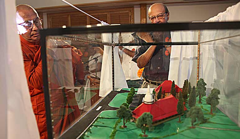A model of the new monastic residency is unveiled. (Pictures by Mahesh Abeyewardene)