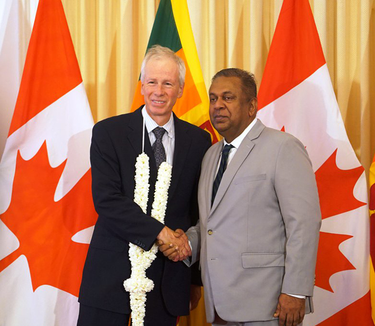 Stephane Dion with his counterpart Mangala Samraweera following a joint press conference at the Foreign Ministry in Colombo.