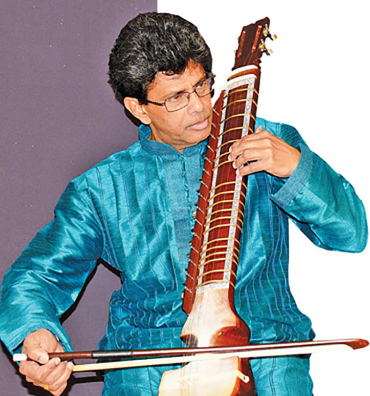 Sarath Kumarasinghe classical esraj player.