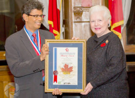 Sarath Kumarasinghe recieves his NEPMCC award from the Lt. Governor of Ontario.
