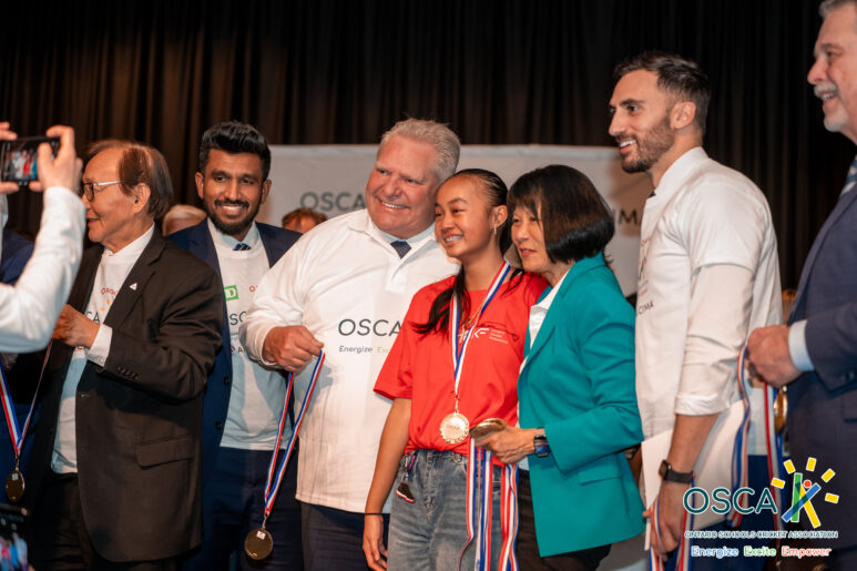 Premier Ford and Mayor Chow presenting recognition awards to young cricketers